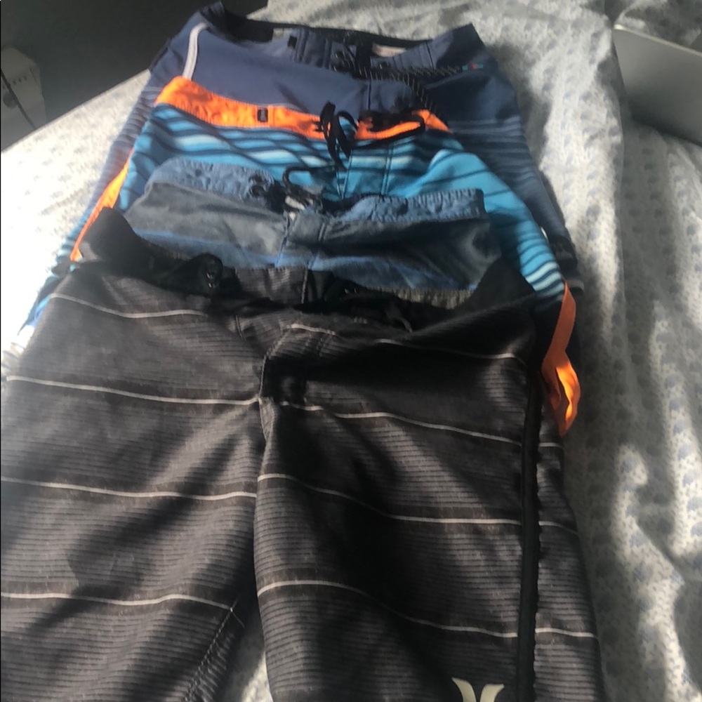 4 boys swim trunks- surfer style- almost new